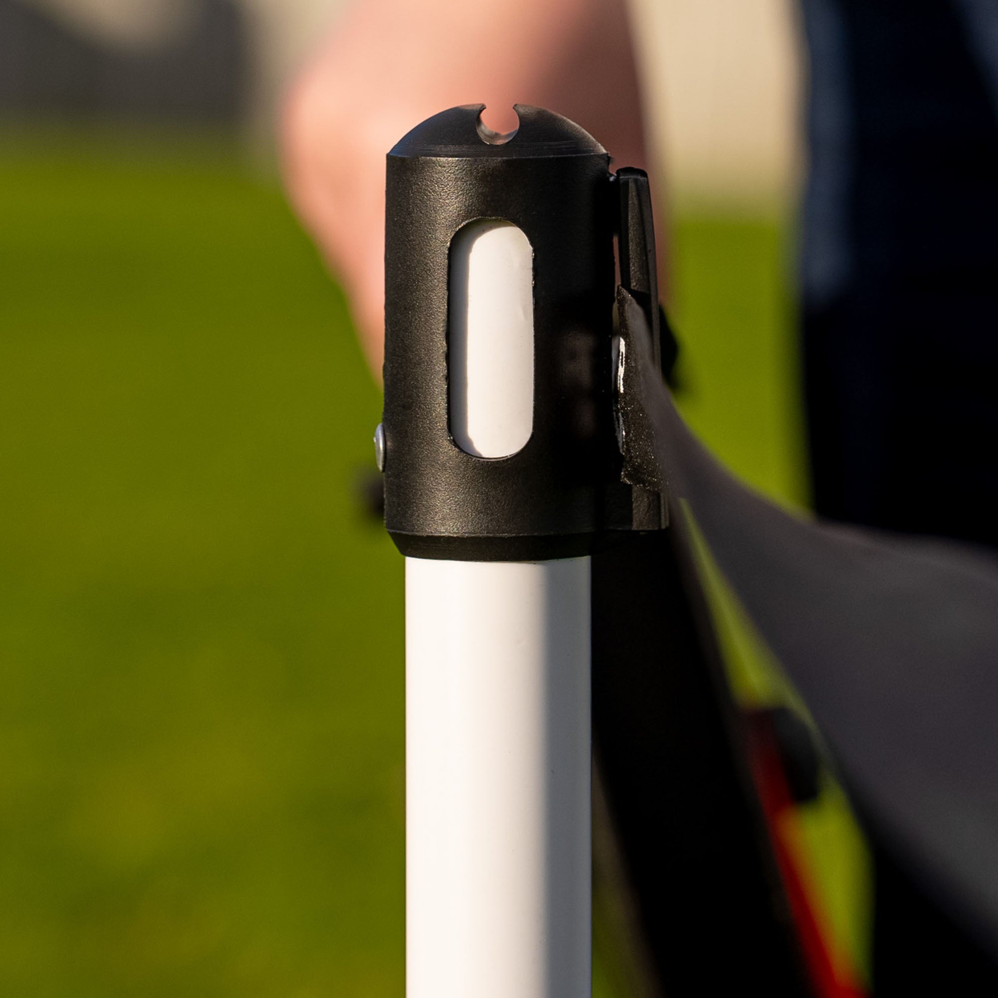 Silver Fern Crowd Barrier Kit, Close-up of barrier webbing and clip mechanism