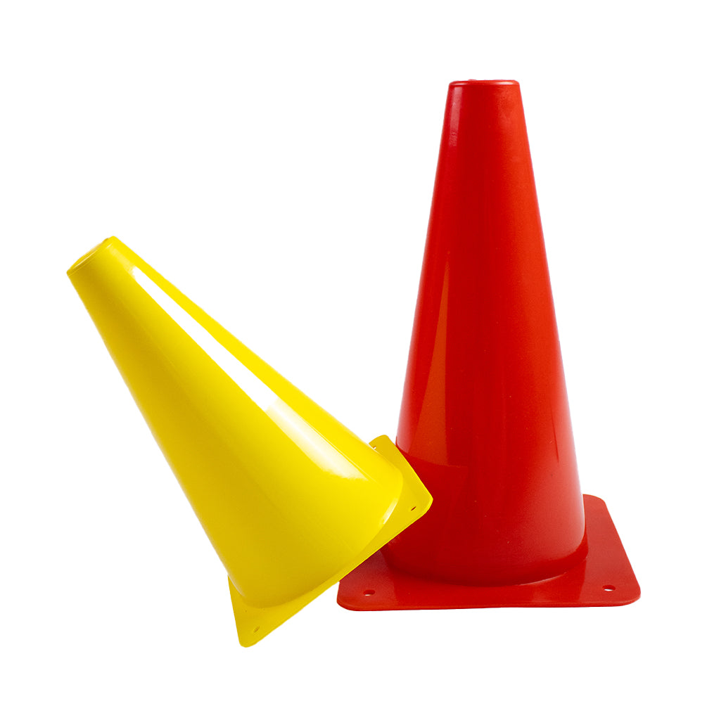 Red and yellow traffic cones on a white background
