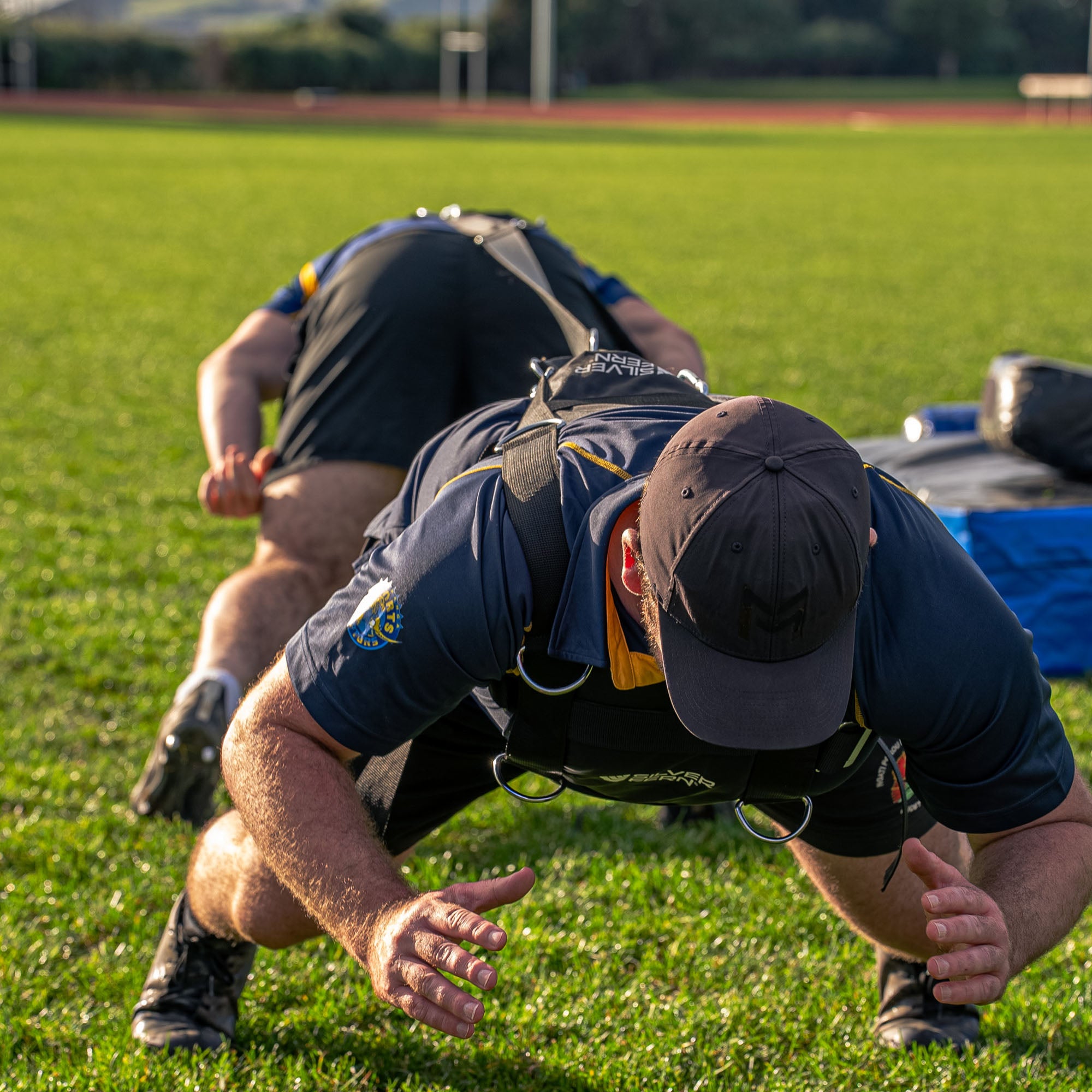 Silver Fern Scrum Ruck Resistance Harness Set Pair, Action shot, harness in use during resistance drill