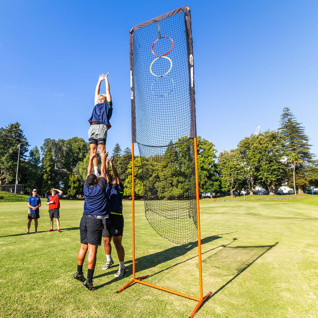 ThrowPro Lineout Target Throwing Net, lifestyle shot, lineout player being lifted next to the ThrowPro.